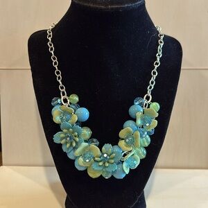 Vintage necklace silver toned chain with lobster clasp. Beautiful floral beads.